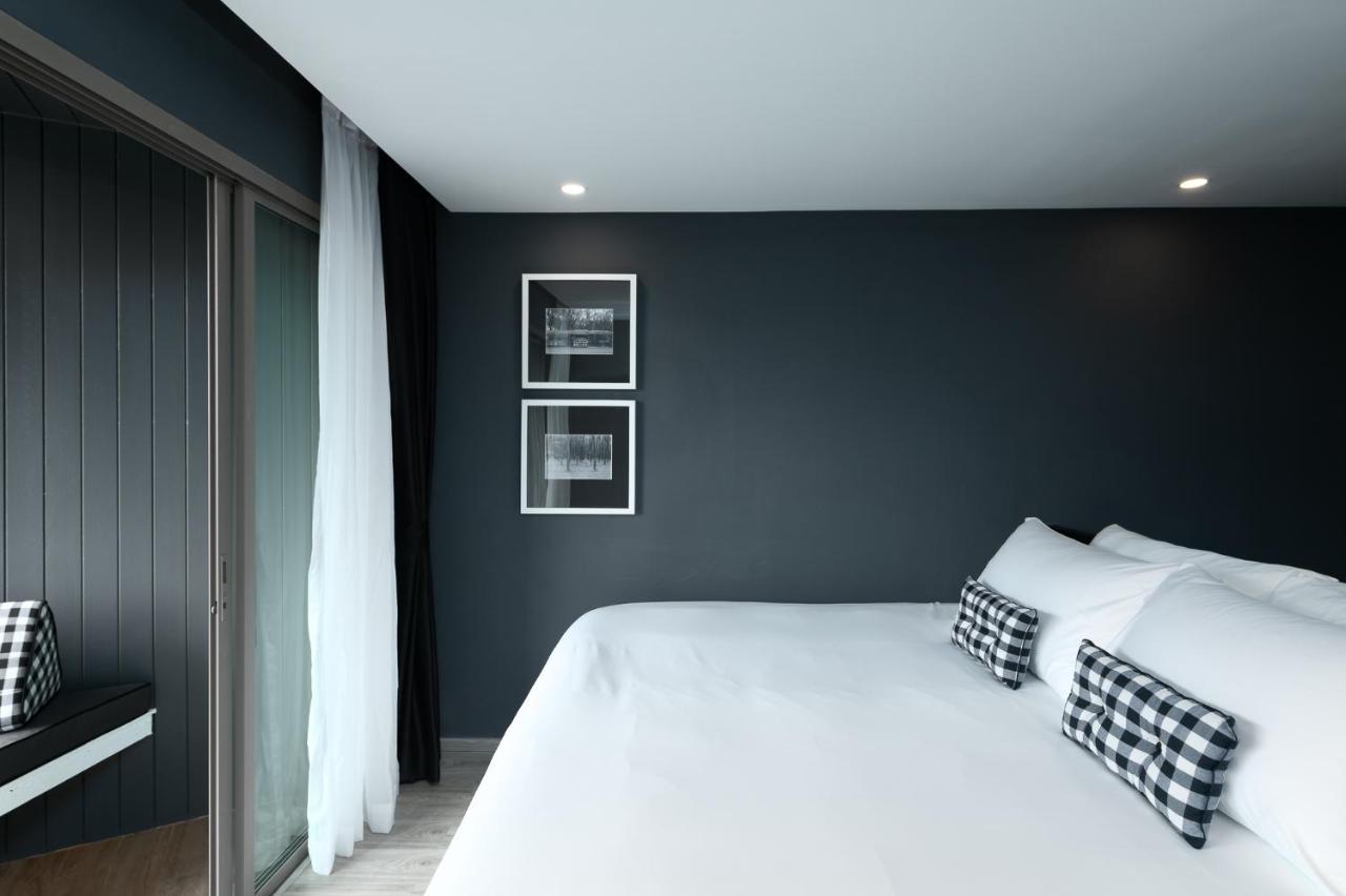 Foto Hotel Phuket Beachfront Εξωτερικό φωτογραφία A bedroom